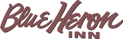 Blue Heron Inn logo in cursive brown lettering